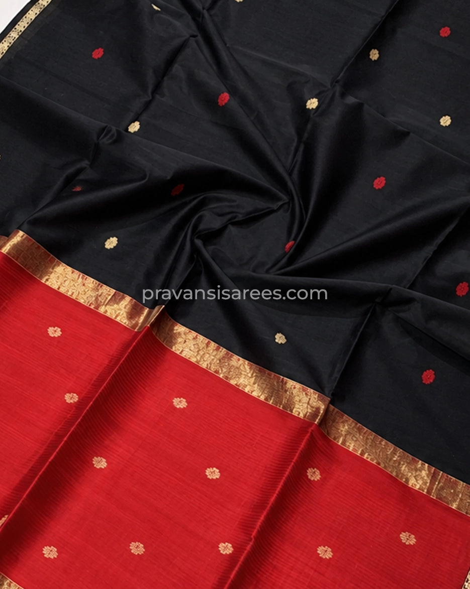 Close-up of Black Silk by Cotton Maheshwari Buttidar Saree with Red Pallu