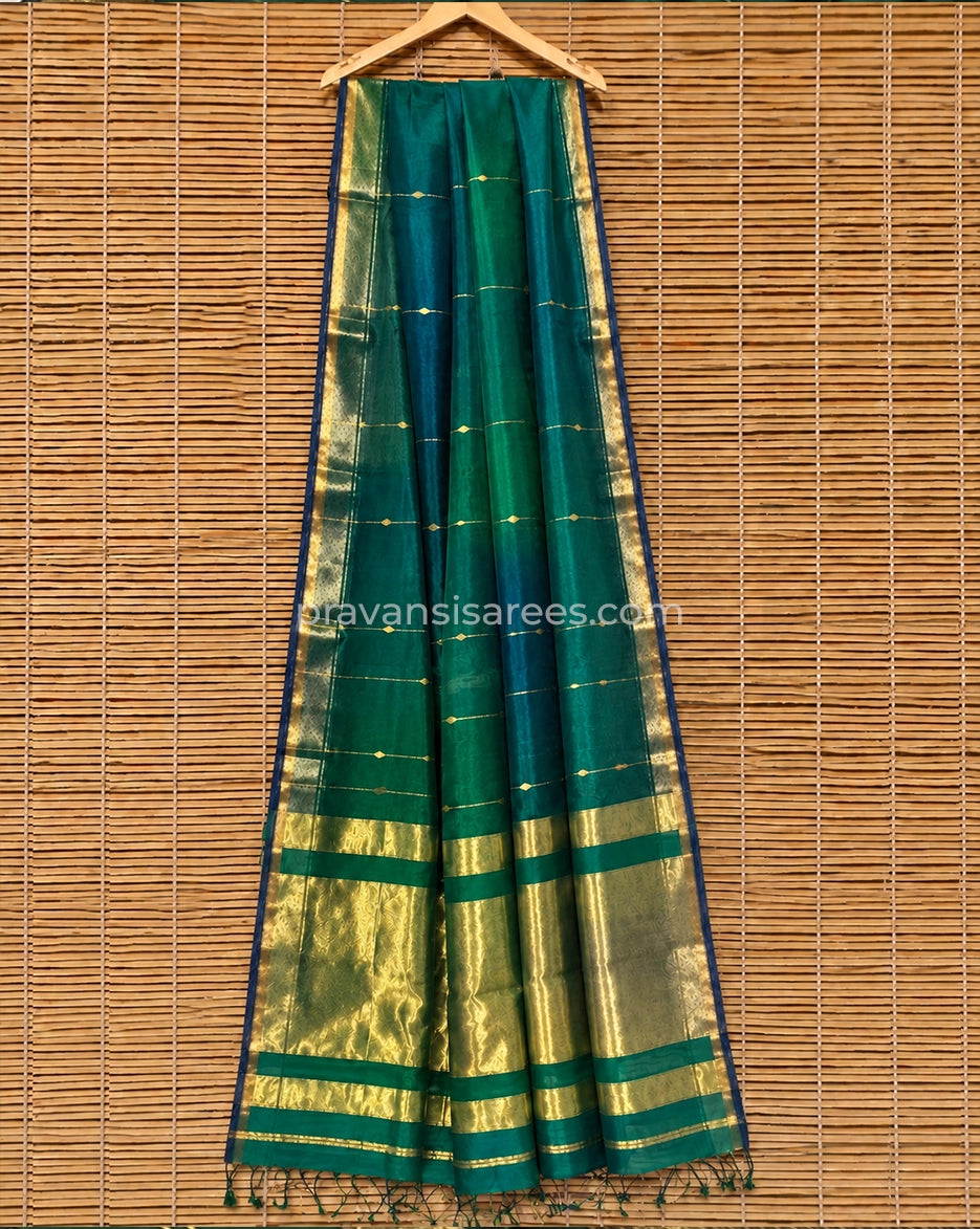 Full view of Emerald Green Silk by Cotton Maheshwari Buttidar Saree with Blue Border