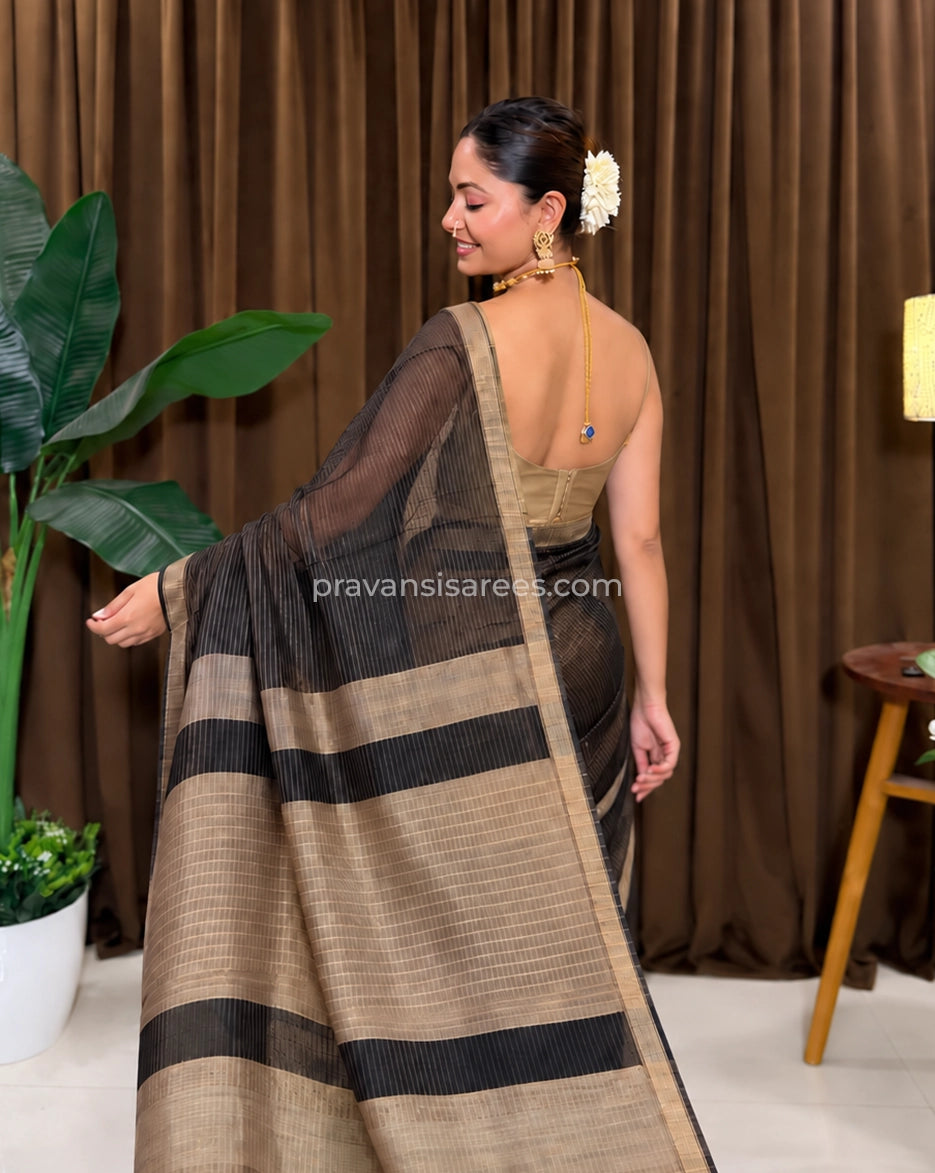 Model view of the Maheshwari Classic Black Striped Saree with Pure Zari Lining showing the saree drape