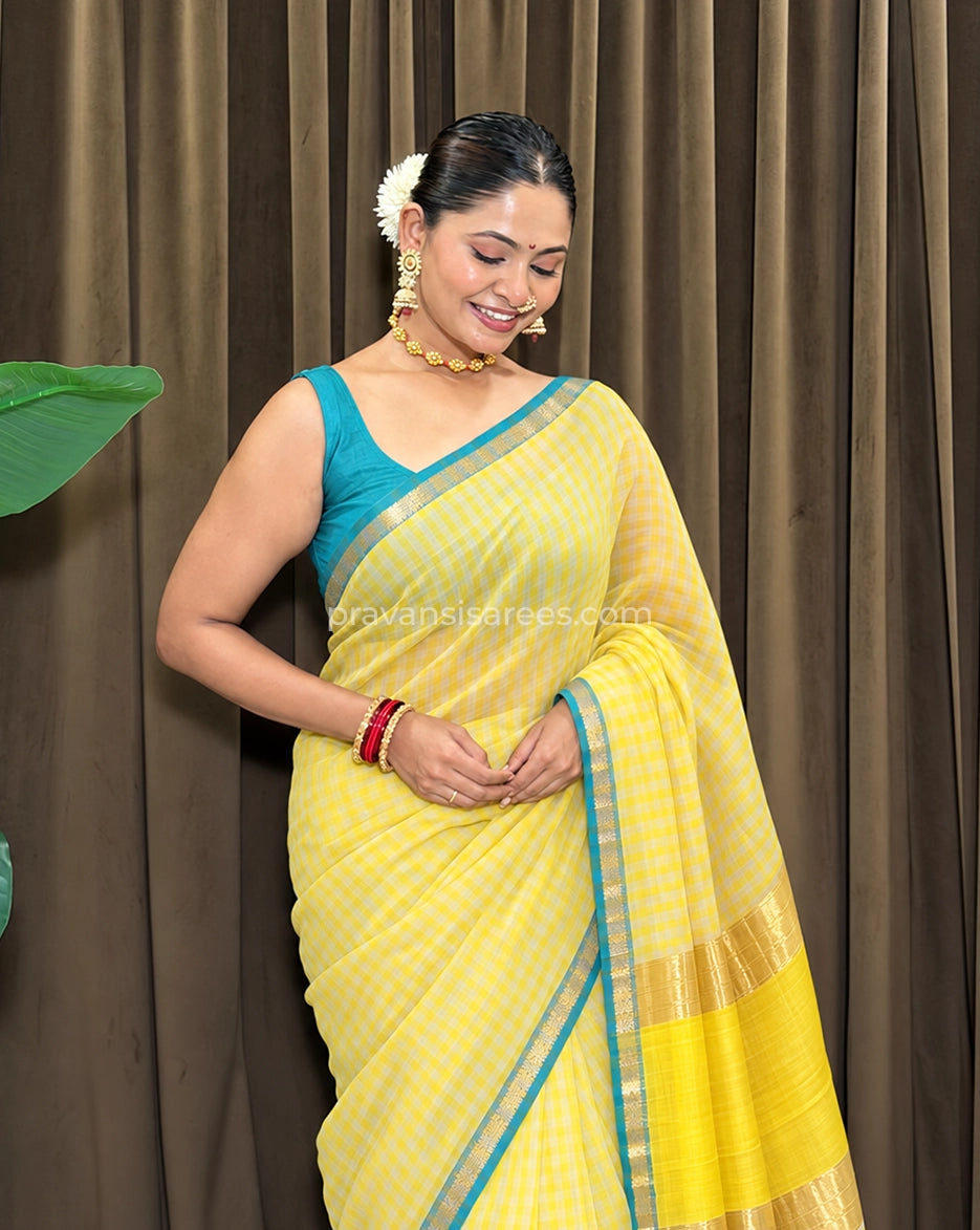 Styled model view of the Maheshwari Pure Yellow Striped Saree