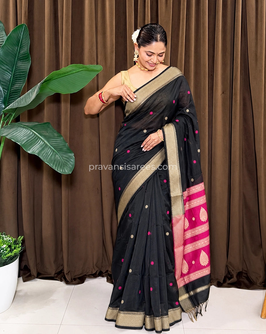 Model wearing the Maheshwari Semi Buttidar Black Saree