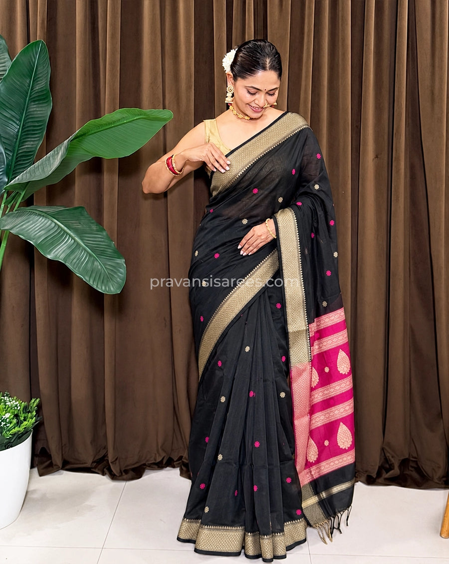 Model wearing the Maheshwari Semi Buttidar Black Saree
