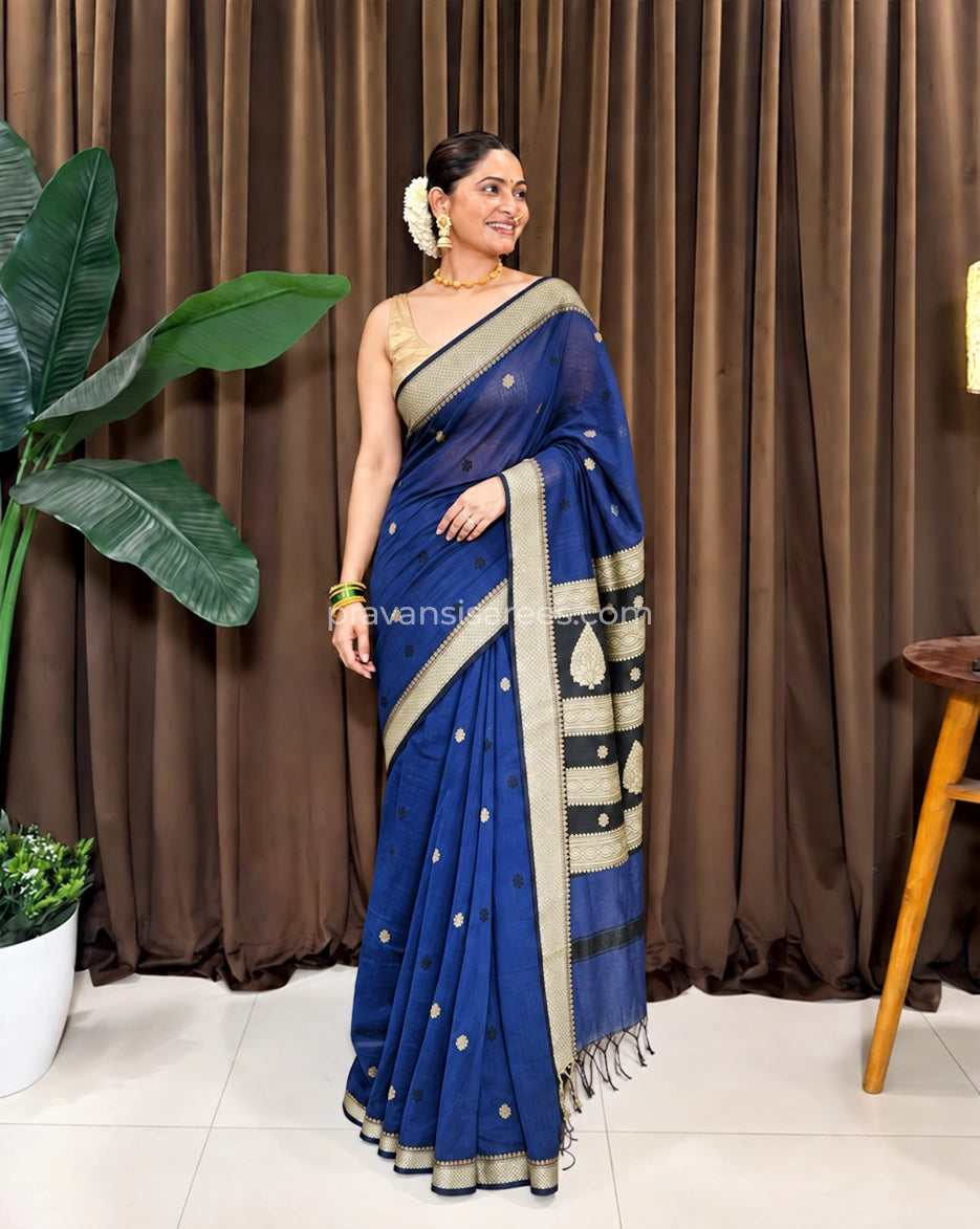 Model wearing the Maheshwari Semi Buttidar Blue Saree