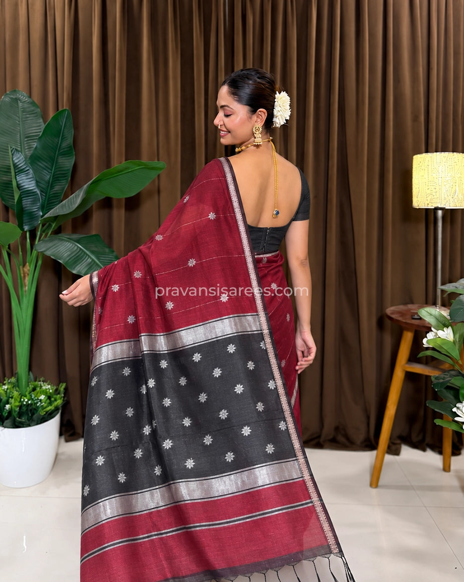 Model view of the Maheshwari Semi Star Butti Maroon Saree showing the saree drape