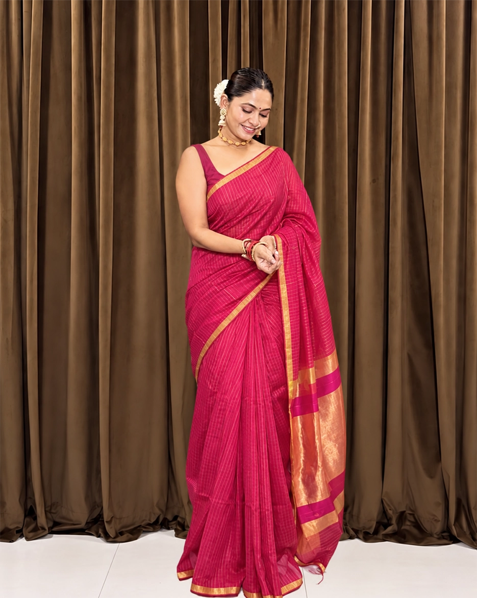 Model wearing the Maheshwari Semi Zari Linings Rani Pink Saree
