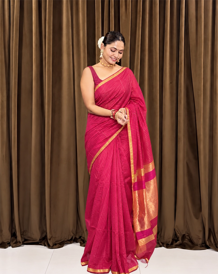 Model wearing the Maheshwari Semi Zari Linings Rani Pink Saree