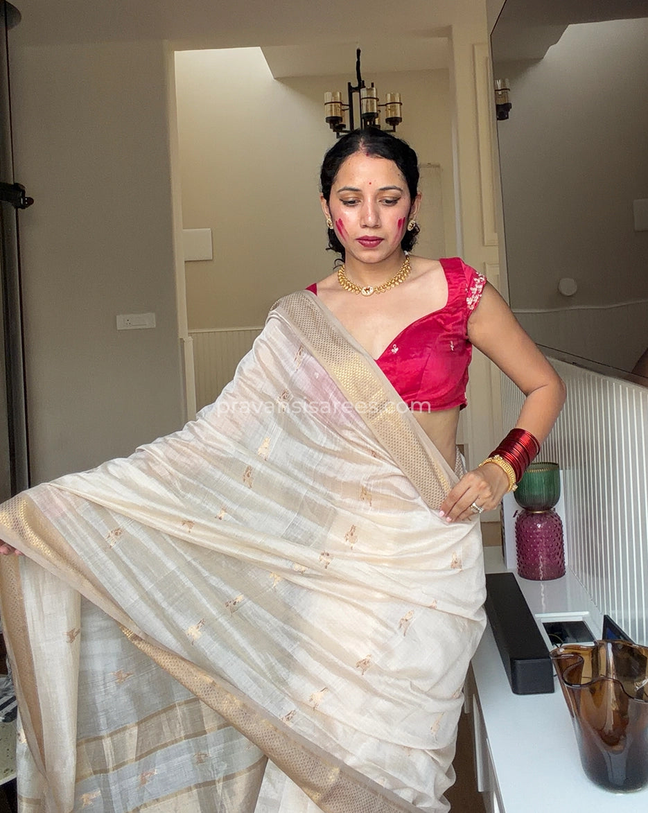 Model view of the Pure Maheshwari Barasingha White Butti Saree showing the saree drape