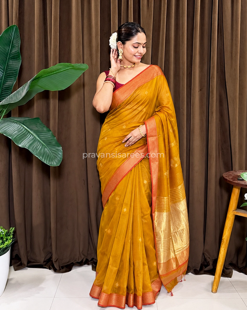 Model wearing the Pure Maheshwari Palledar Mustard Saree