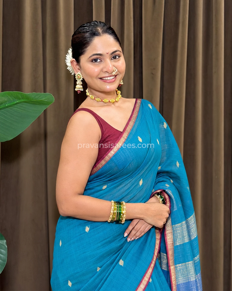 Styled model view of the Pure Maheshwari Shaded Butti Blue Saree