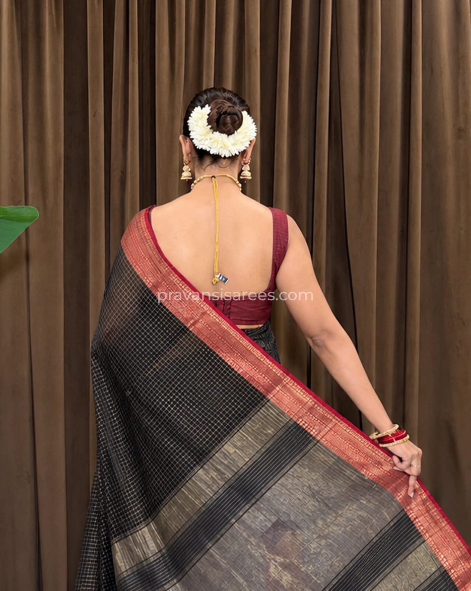 Model view of the Pure Maheshwari Zari Checks Grey Saree showing the saree drape