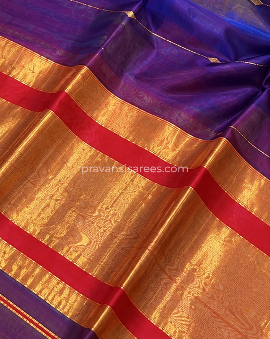Close-up of Purple Silk by Cotton Maheshwari Buttidar Saree with Red Border