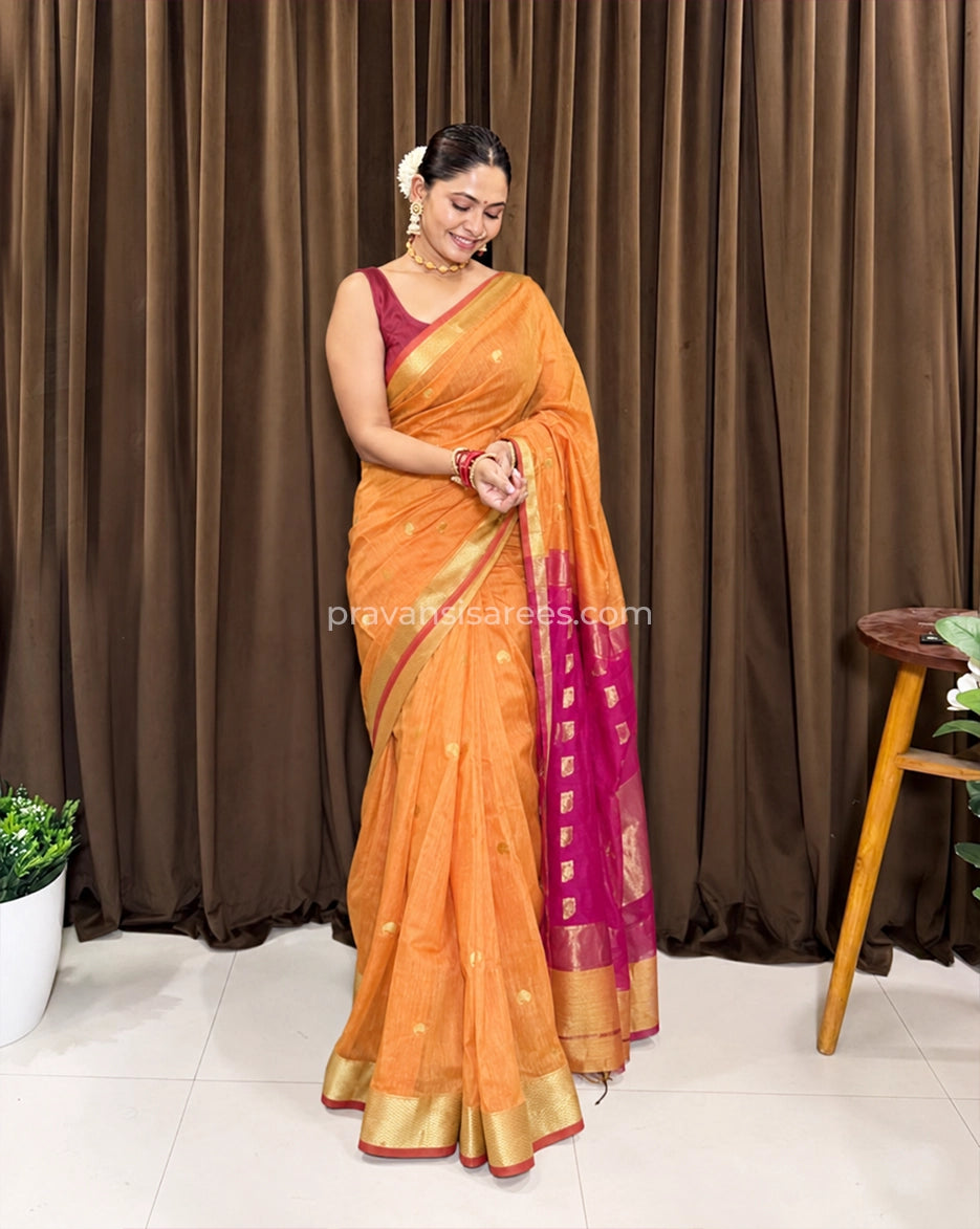 Model wearing the Semi Maheshwari Kari Butti Orange Saree
